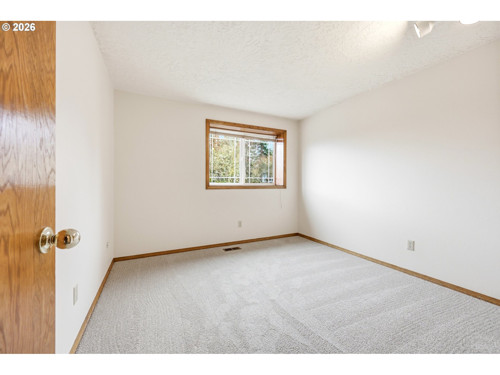 419 Southwest Day Court Gresham, OR 97080 - Photo 27 of 44 a view of an empty room with a window