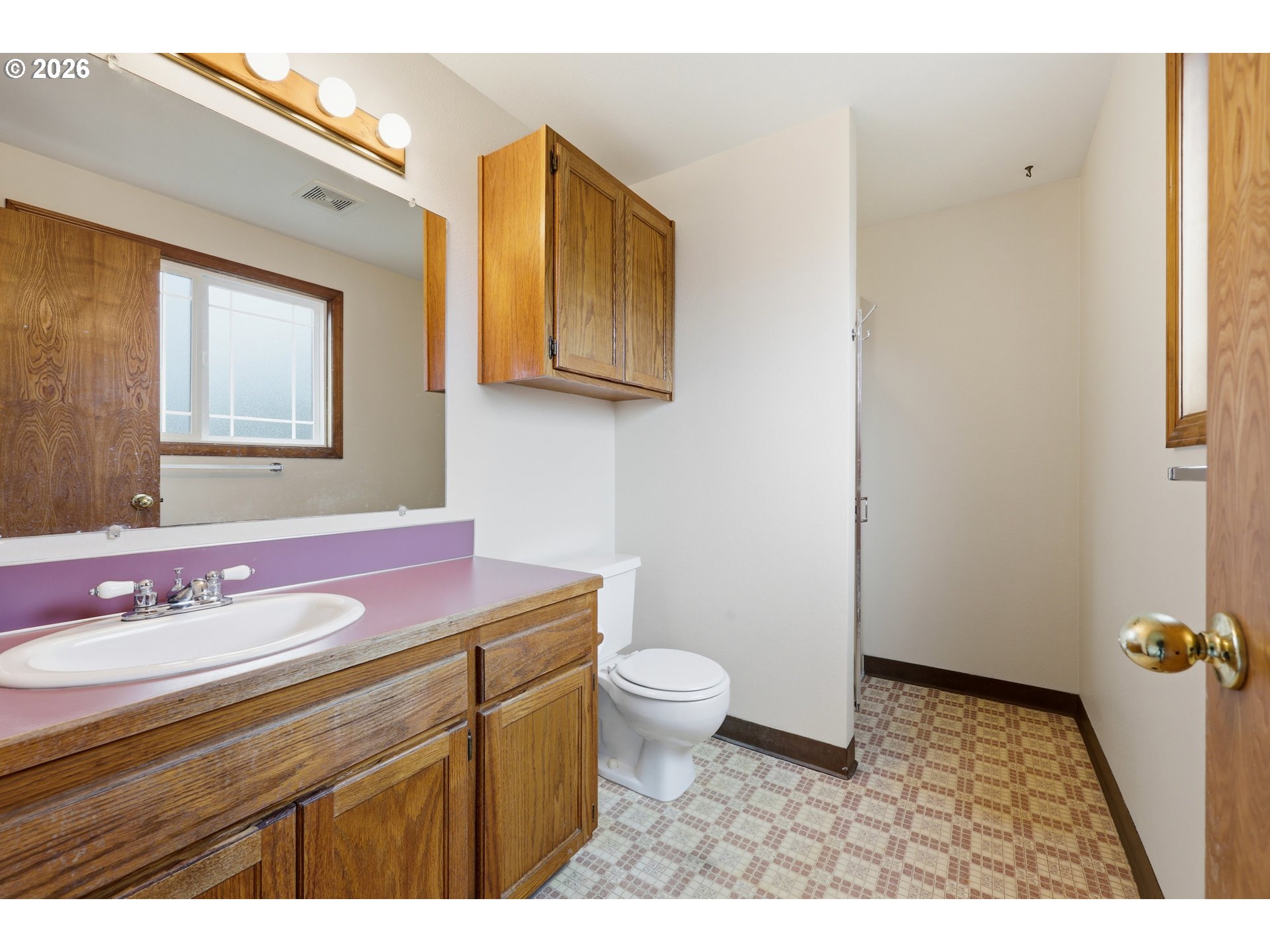 419 Southwest Day Court Gresham, OR 97080 - Photo 29 of 44 a bathroom with a sink a toilet and mirror