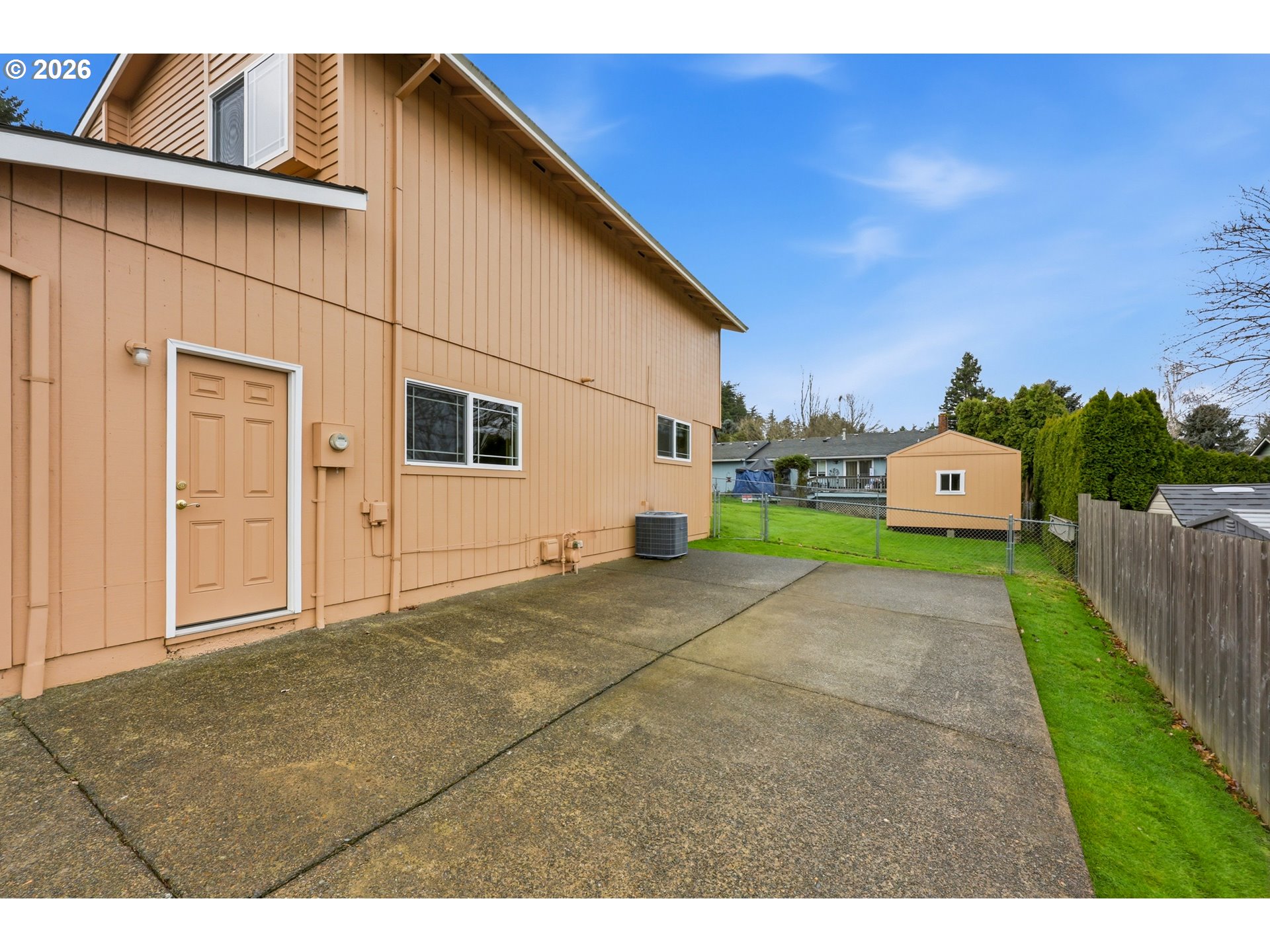 419 Southwest Day Court Gresham, OR 97080 - Photo 32 of 44 a front view of a house with a yard and garage