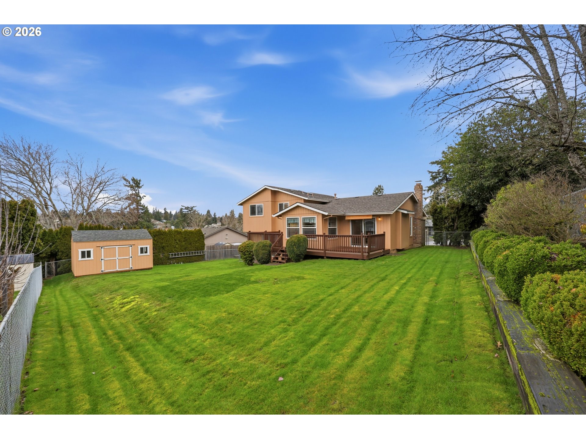 419 Southwest Day Court Gresham, OR 97080 - Photo 33 of 44 a view of a big house with a big yard and large trees