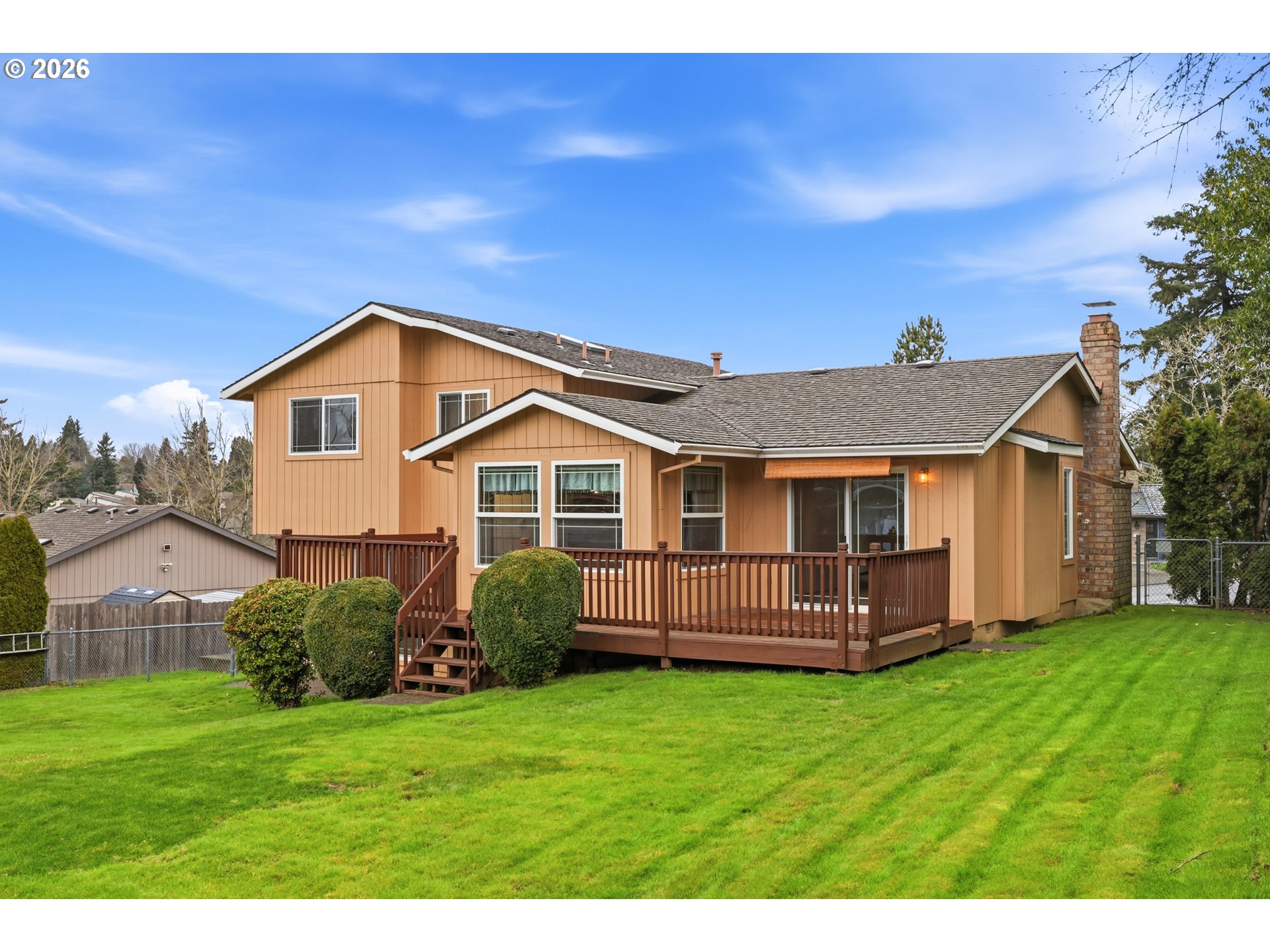 419 Southwest Day Court Gresham, OR 97080 - Photo 34 of 44 a front view of a house with a garden
