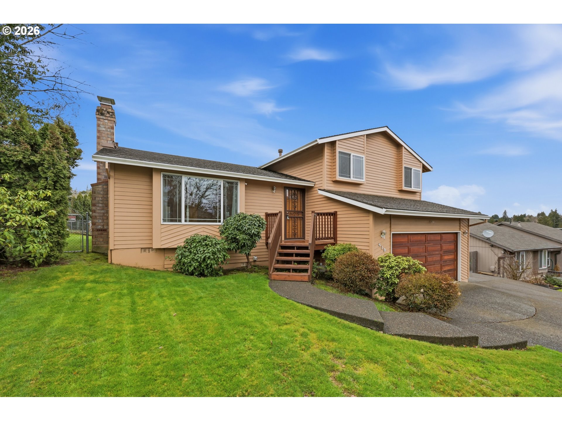 419 Southwest Day Court Gresham, OR 97080 - Photo 36 of 44 a front view of a house with a yard