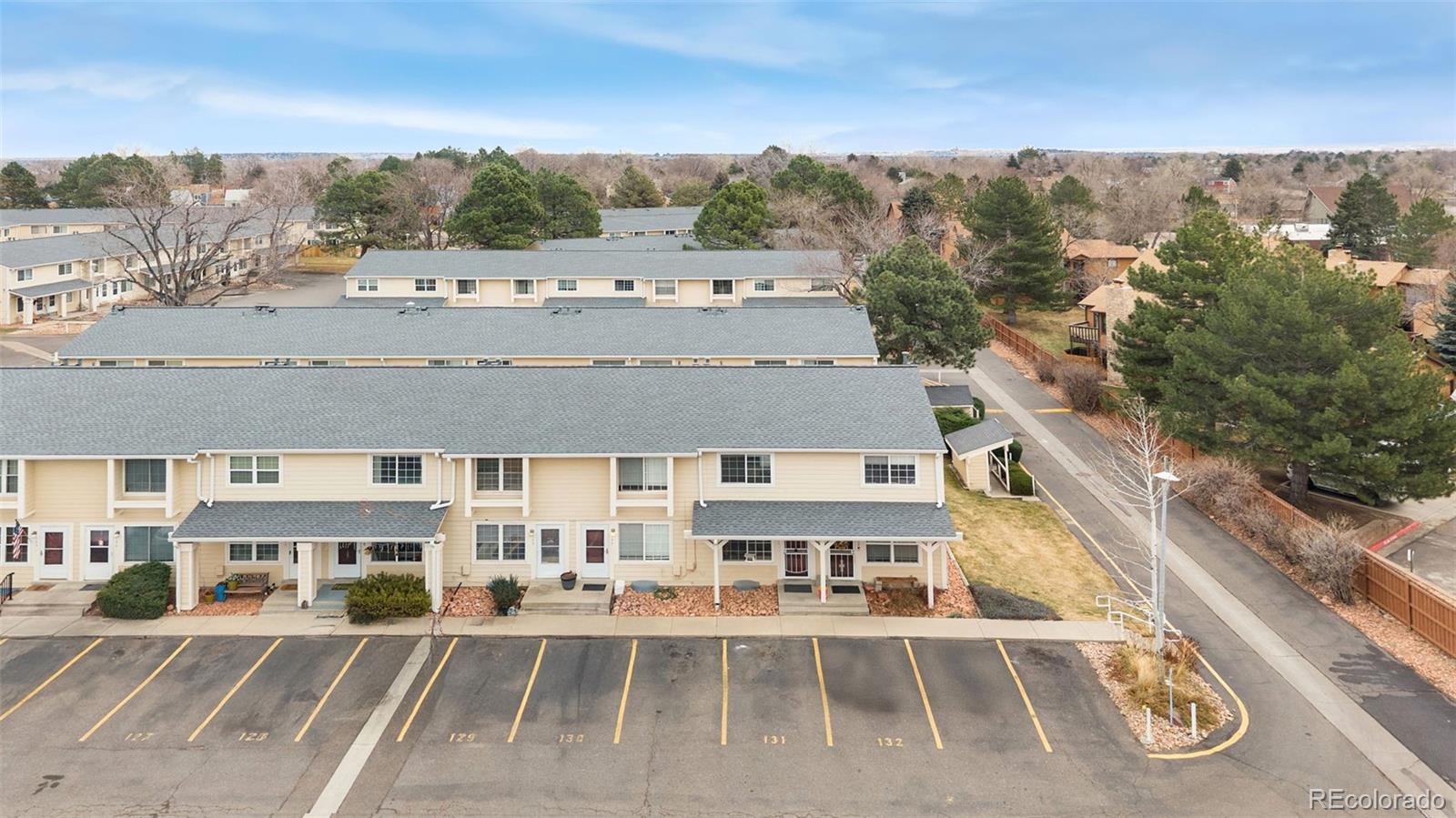 8919 Field Street, Unit 131 Broomfield, CO 80021 - Photo 16 of 27 an aerial view of residential houses with outdoor space