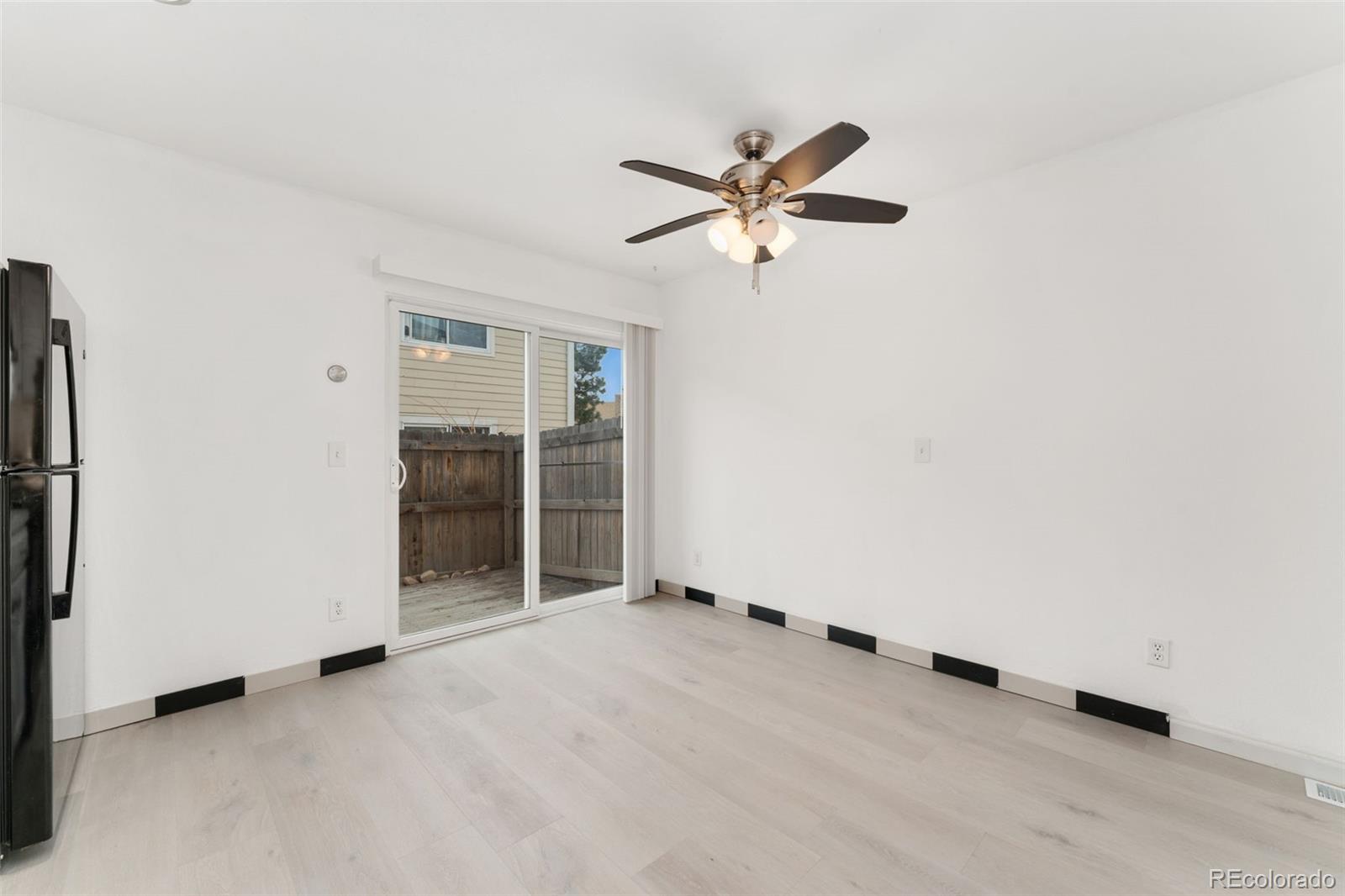 8919 Field Street, Unit 131 Broomfield, CO 80021 - Photo 9 of 27 a view of an empty room with a window