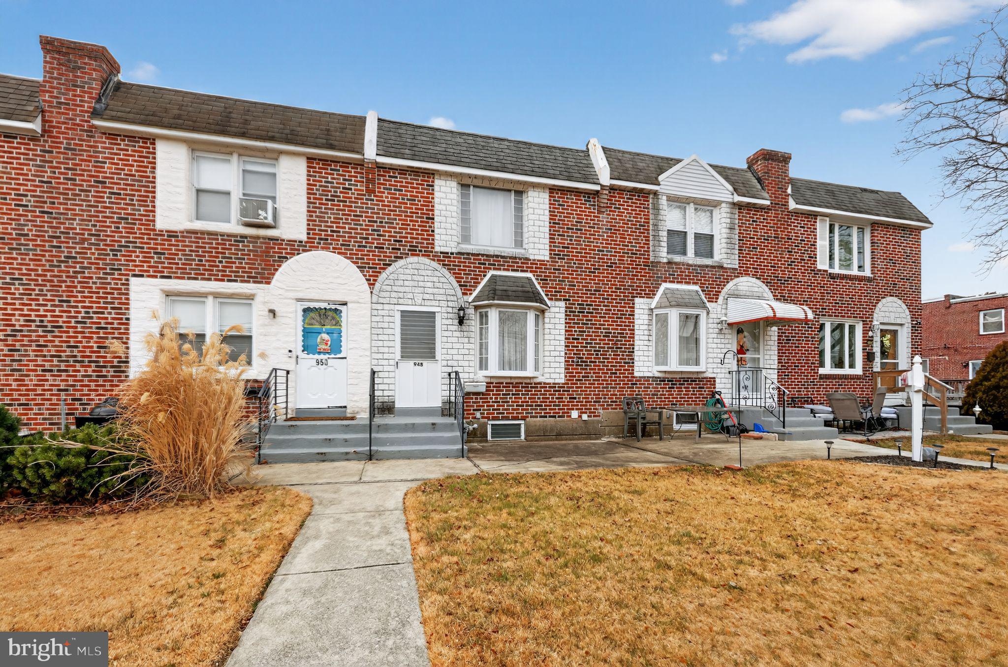 a front view of a house with swimming pool