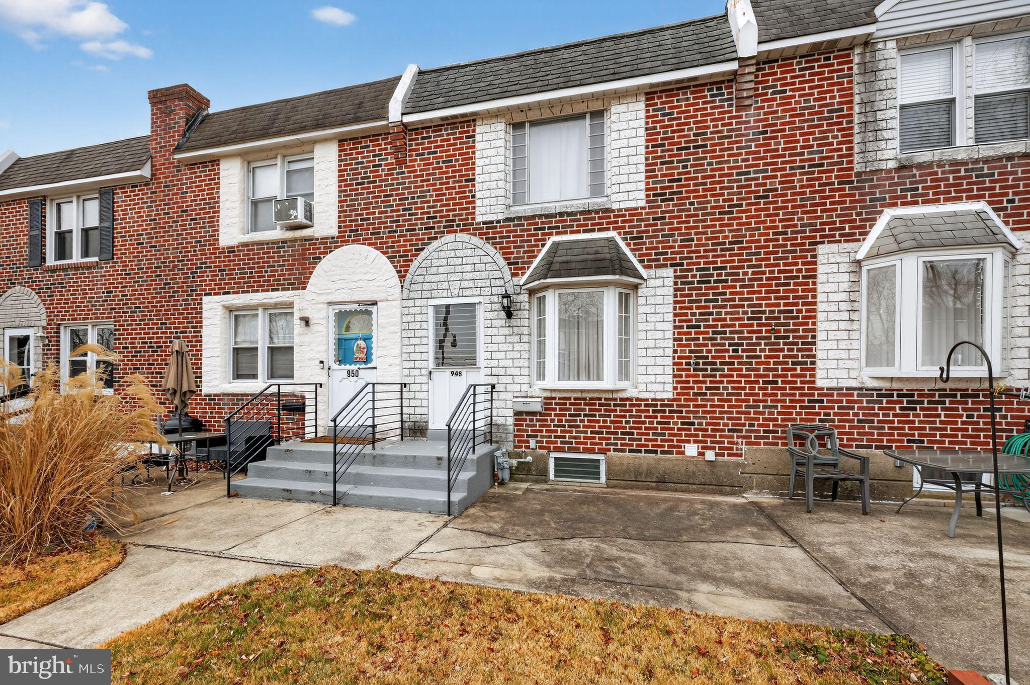 948 Grant Road Folcroft, PA 19032 - Photo 2 of 31 a front view of a house with a patio