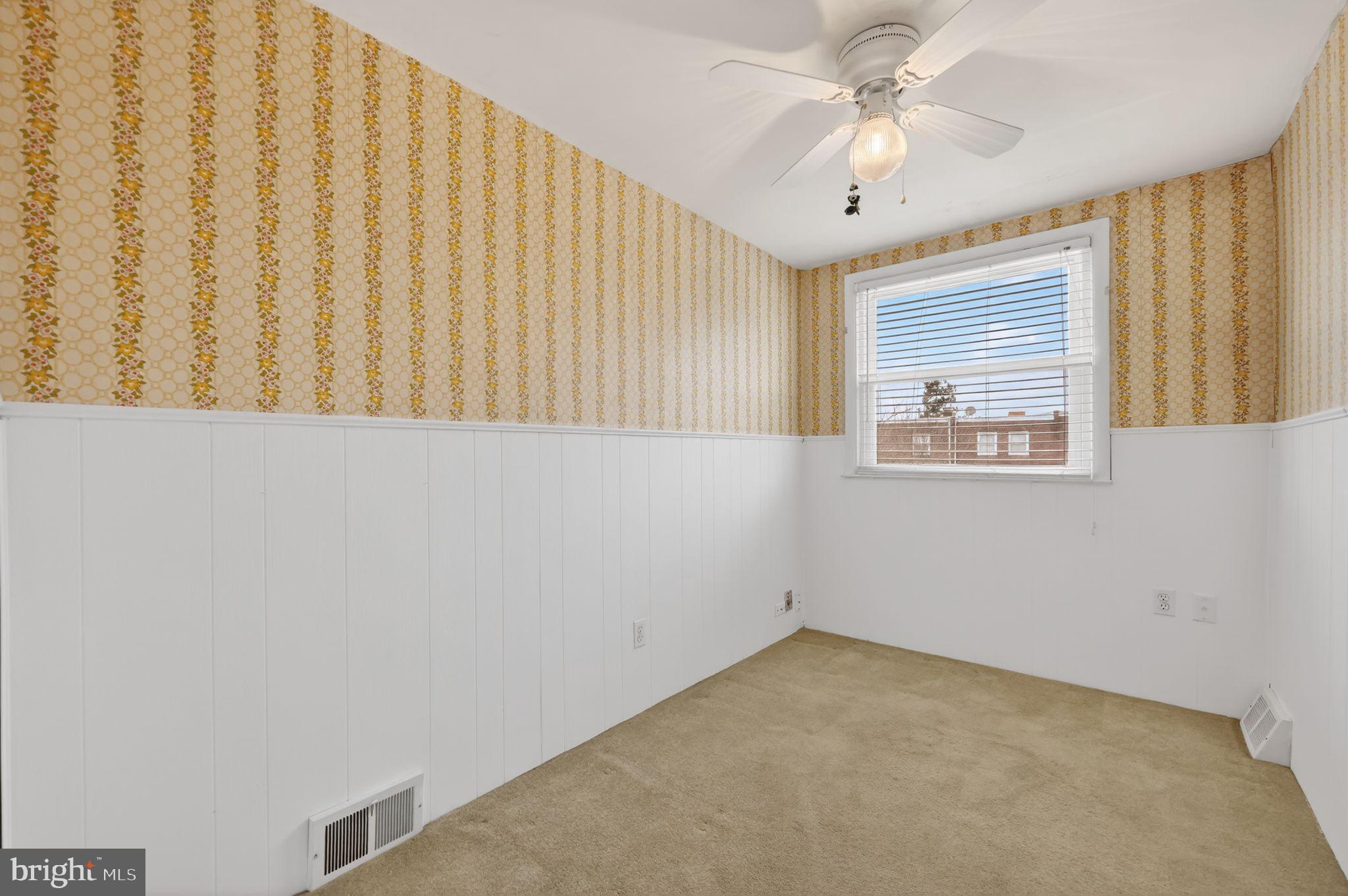 948 Grant Road Folcroft, PA 19032 - Photo 24 of 31 a view of a livingroom with a ceiling fan and window