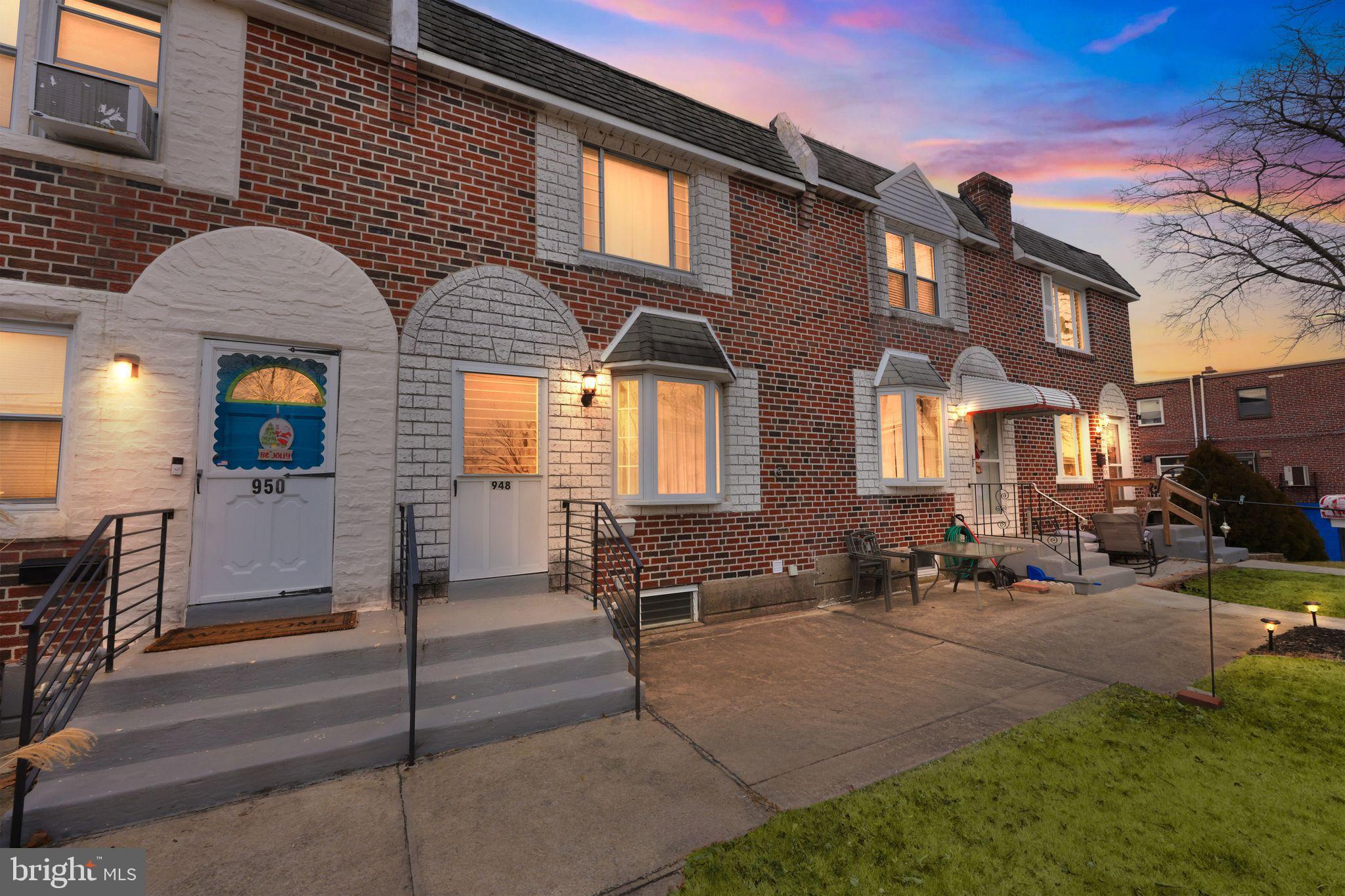 948 Grant Road Folcroft, PA 19032 - Photo 3 of 31 a front view of a house with many windows
