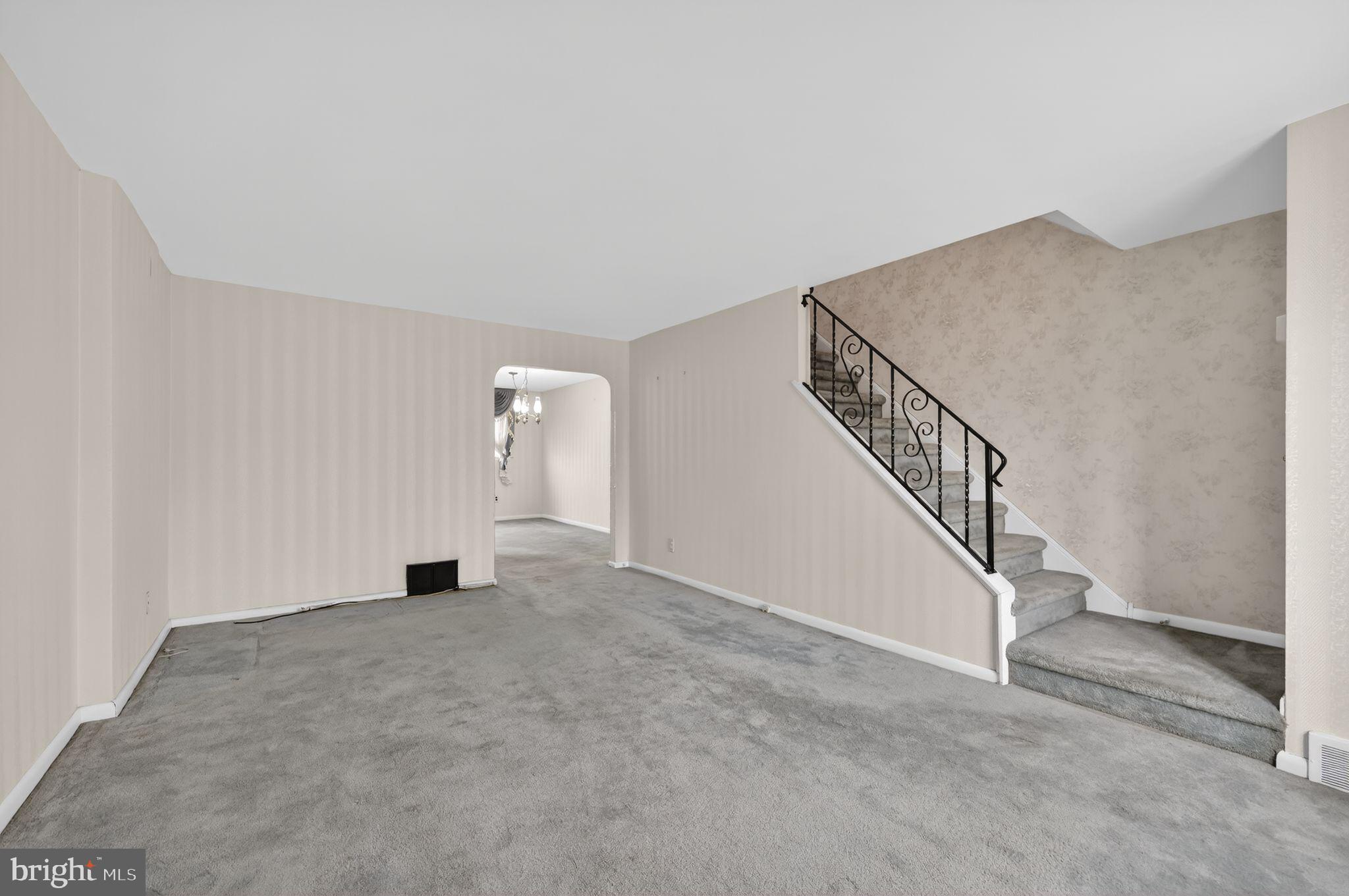 948 Grant Road Folcroft, PA 19032 - Photo 7 of 31 a view of an empty room with stairs