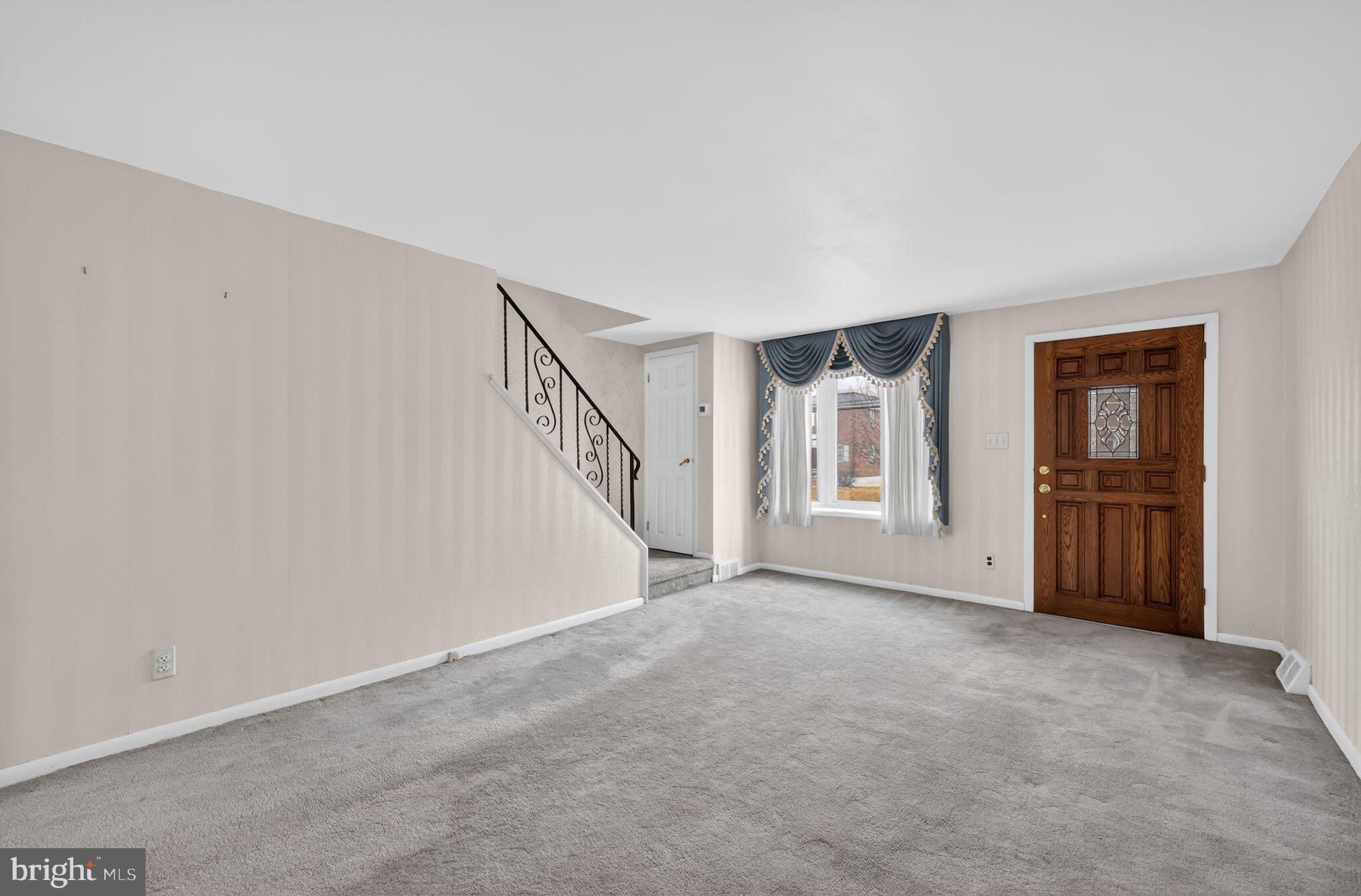 948 Grant Road Folcroft, PA 19032 - Photo 8 of 31 a view of an empty room with stairs