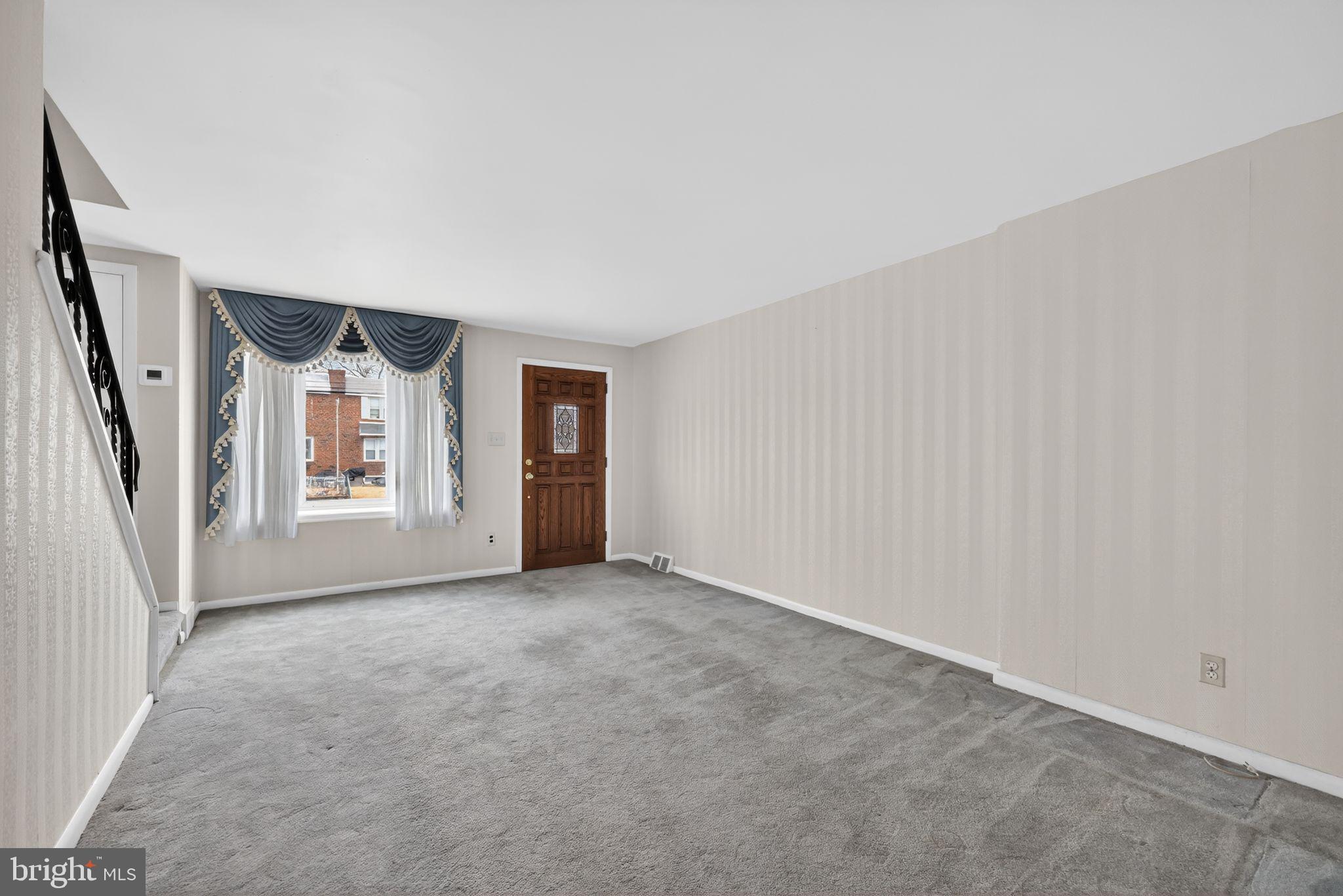 948 Grant Road Folcroft, PA 19032 - Photo 9 of 31 an empty room with windows