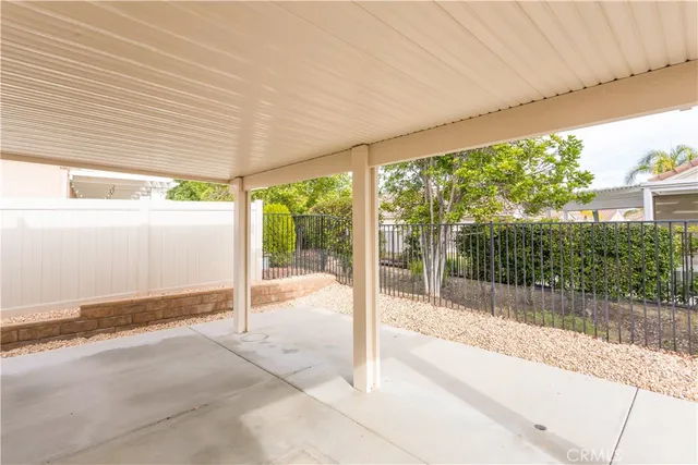 a view of a backyard of the house