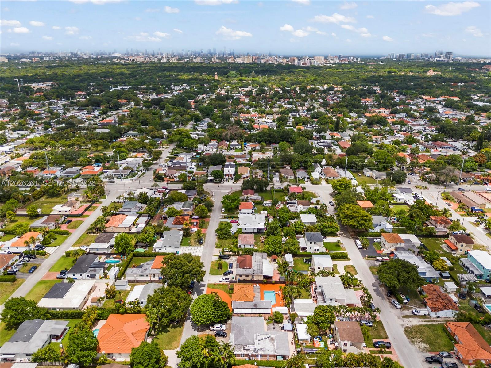 6250 Southwest 20th Terrace Miami, FL 33155 - Photo 41 of 42 an aerial view of residential houses with outdoor space and trees