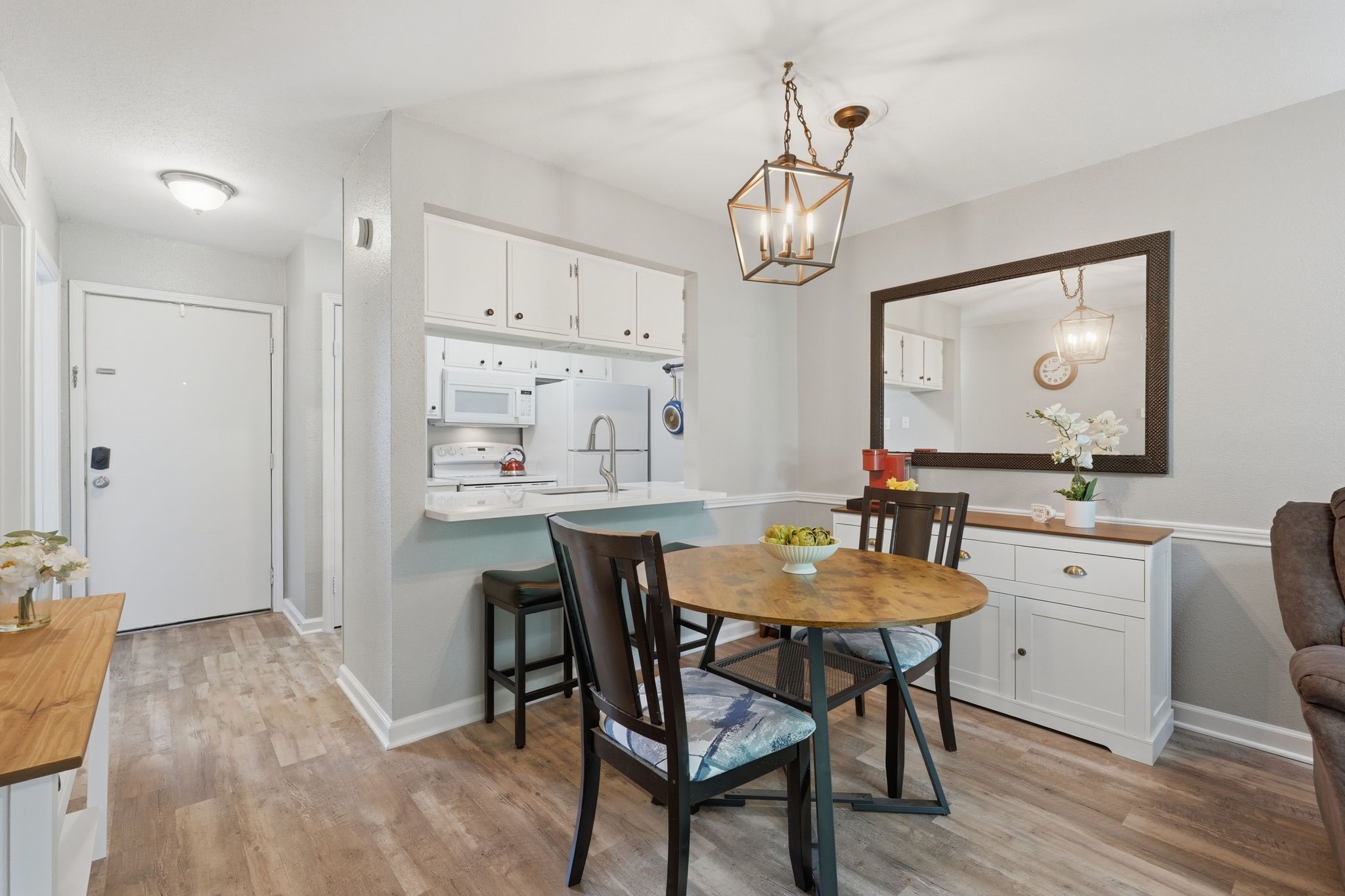 13151 Walden Road, Unit 131 Montgomery, TX 77356 - Photo 9 of 35 Elegant dining space with a bright, open layout and seamless flow.