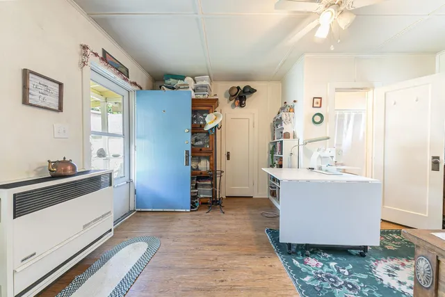 a view of kitchen with furniture and cabinets