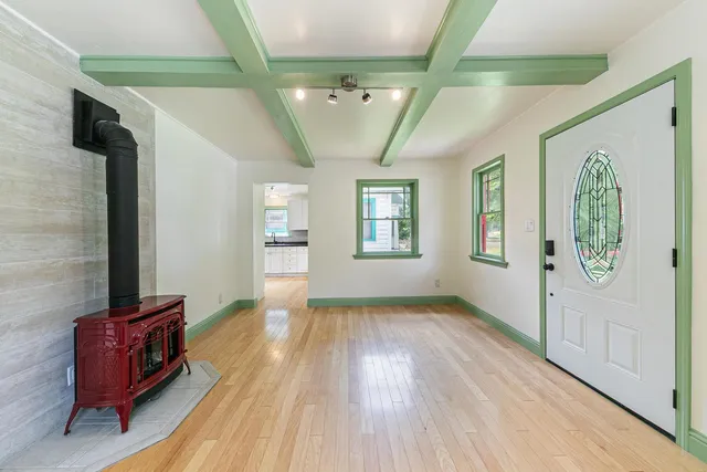a view of entryway with stairs and wooden floor