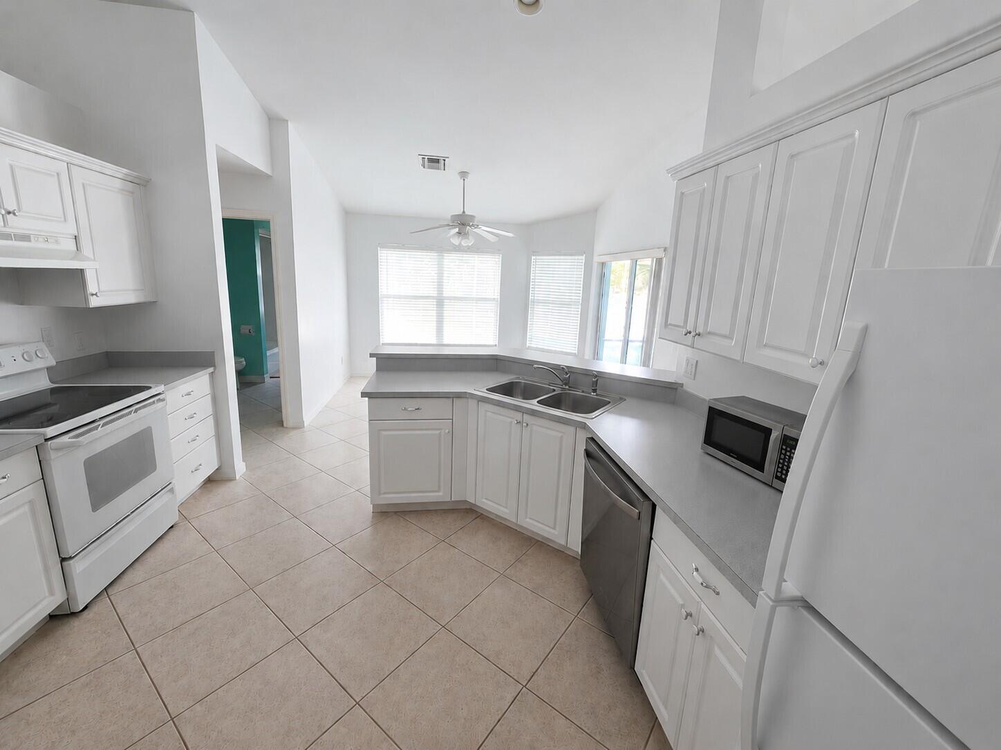 2049 San Marco Road Marco Island, FL 34145 - Photo 33 of 71 Kitchen View to Pool with AI Editing