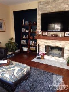 1889 Ribera Drive Oxnard, CA 93030 - Photo 6 of 22 a living room with furniture and a fireplace
