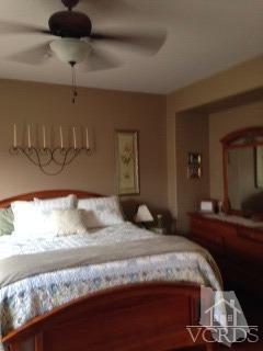 1889 Ribera Drive Oxnard, CA 93030 - Photo 9 of 22 a bedroom with a bed and a dresser