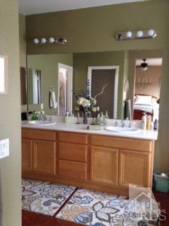 1889 Ribera Drive Oxnard, CA 93030 - Photo 10 of 22 a bathroom with a sink and a mirror