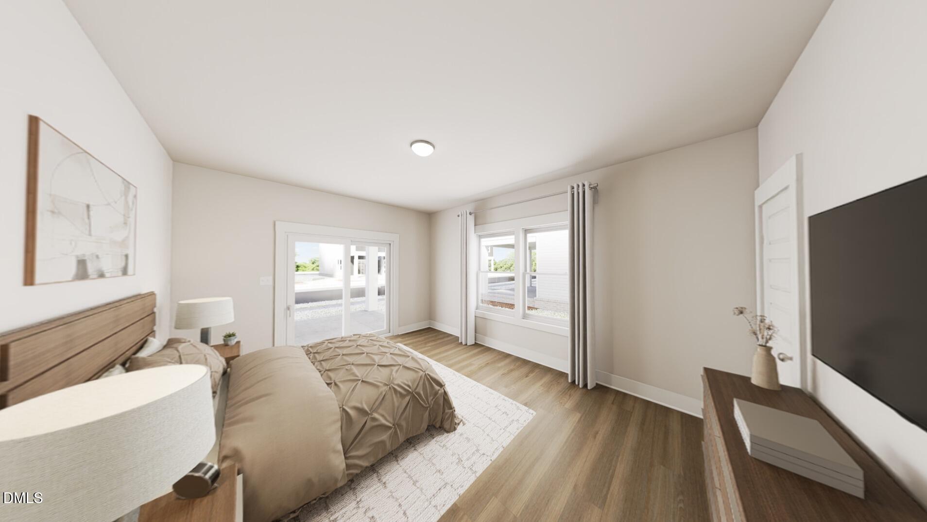 1167 Lamplighter Drive Raleigh, NC 27604 - Photo 11 of 20 a spacious bedroom with a bed and a flat screen tv