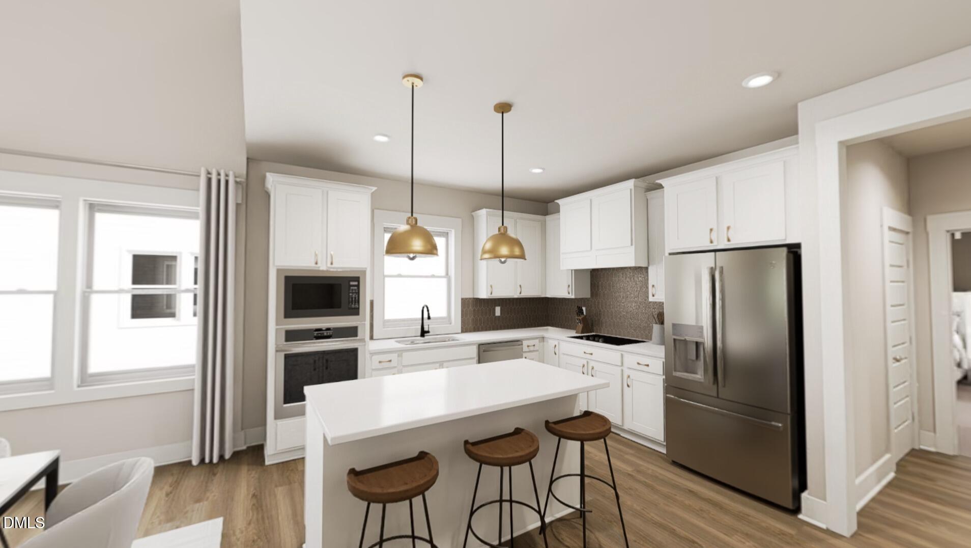 1167 Lamplighter Drive Raleigh, NC 27604 - Photo 6 of 20 a kitchen with stainless steel appliances a refrigerator a stove a sink cabinets and a dining table with wooden floor