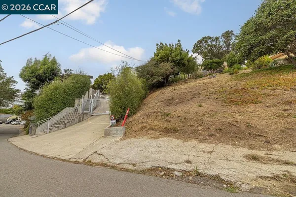 a view of a street with a building