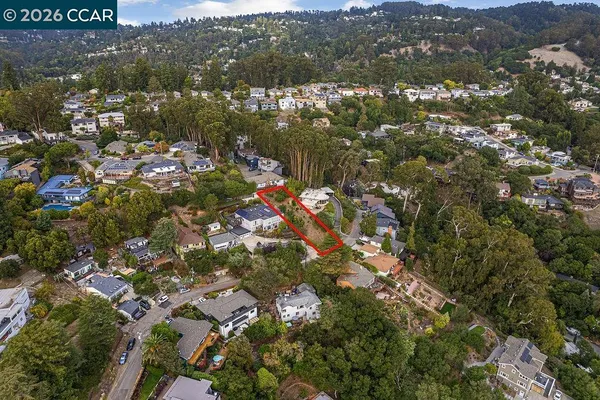 an aerial view of house with yard