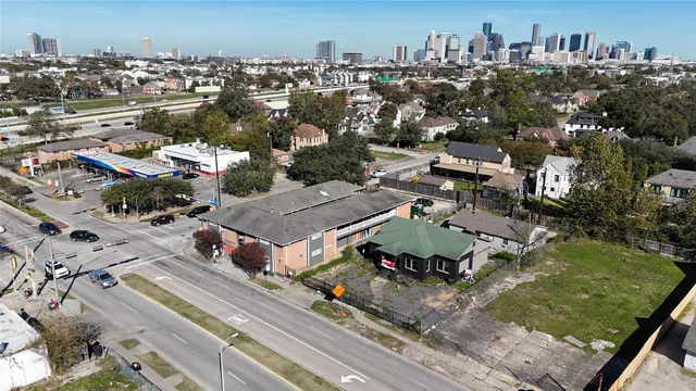 an aerial view of a house with a garden