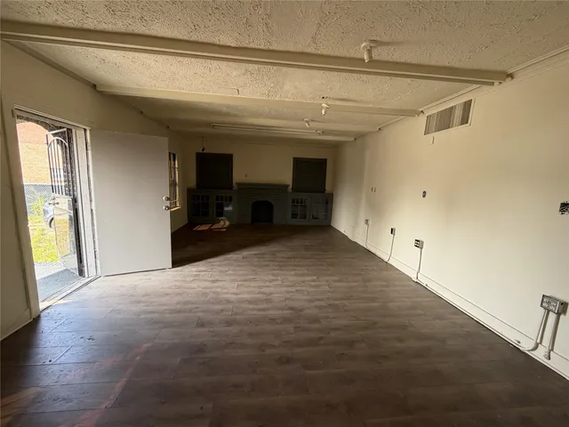 a view of a livingroom with a staircase