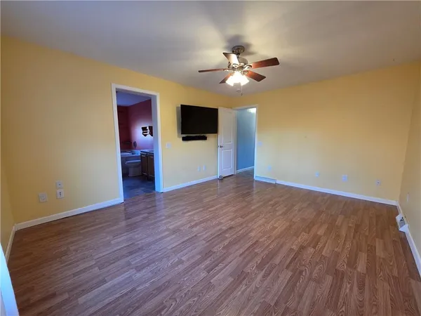 a room with furniture and window