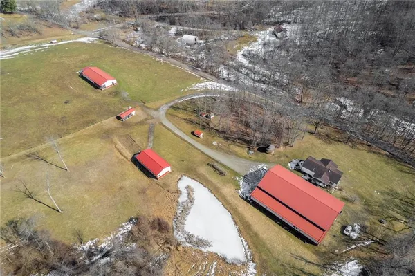 a view of a house with a big yard