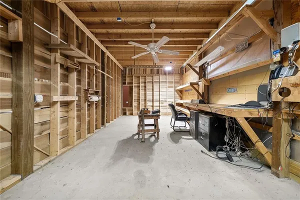 a view of an empty room with a garage