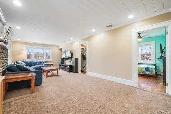 a view of a livingroom with furniture and a couch