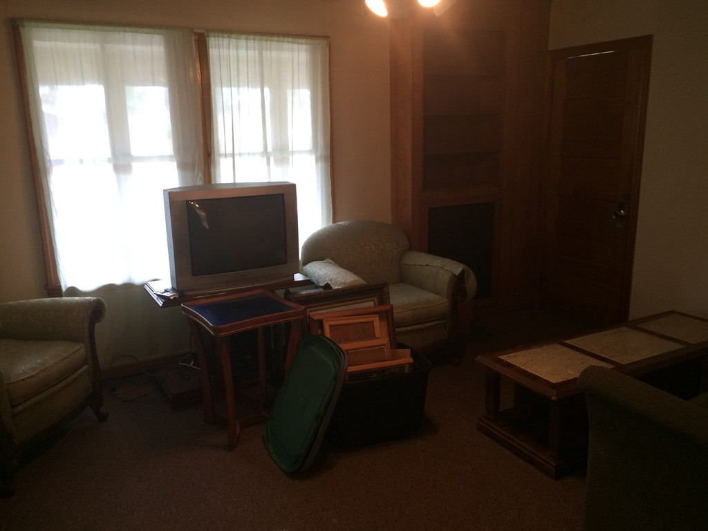 12 Frontenac Street Springfield, MA 01151 - Photo 6 of 9 a view of a workspace with furniture and a window