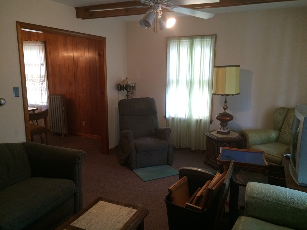 12 Frontenac Street Springfield, MA 01151 - Photo 7 of 9 a living room with furniture and a window