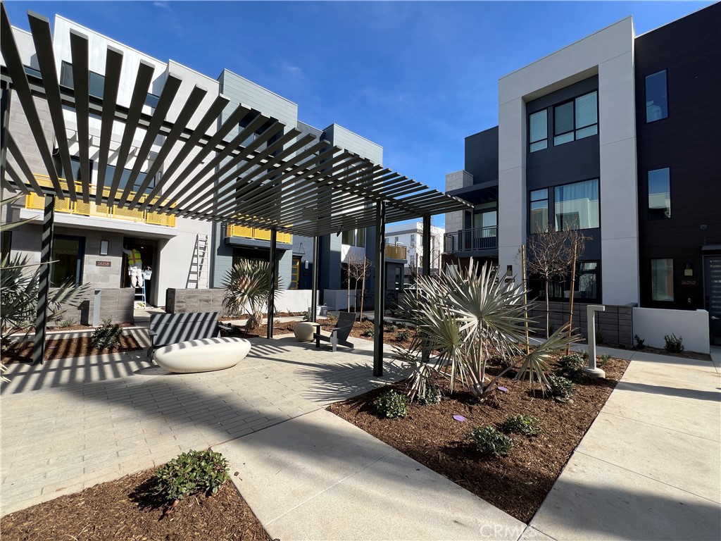 a view of a chairs and table in a patio