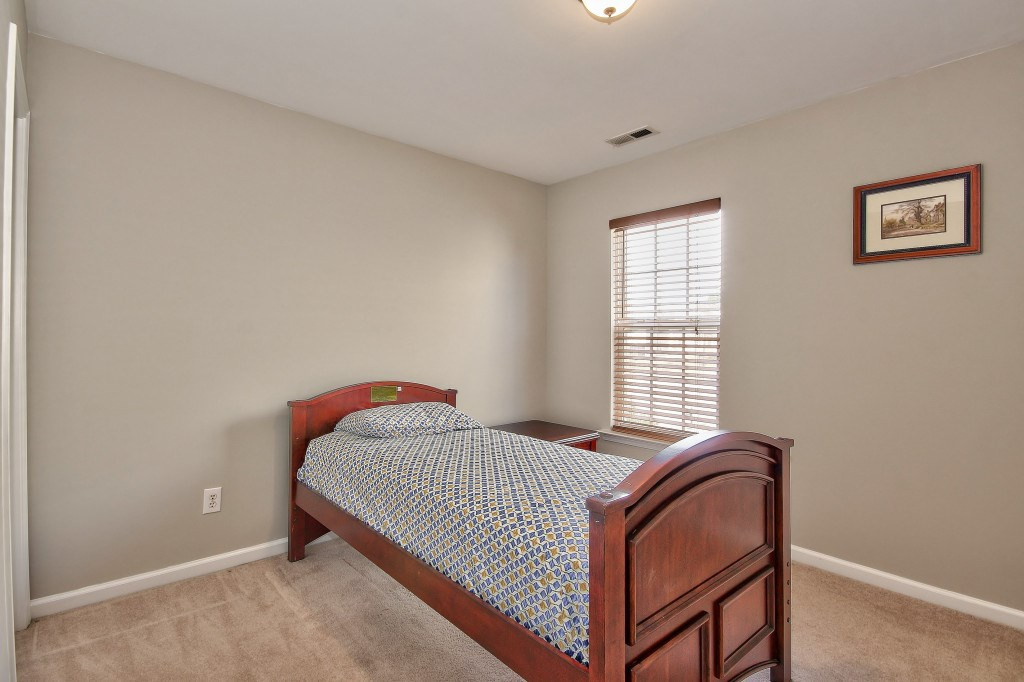 7754 San Gabriel Street Raleigh, NC 27613 - Photo 22 of 25 Upstairs among the four bedrooms, there is also a large laundry room which makes doing laundry so much easier and a large linen closet! Bedroom