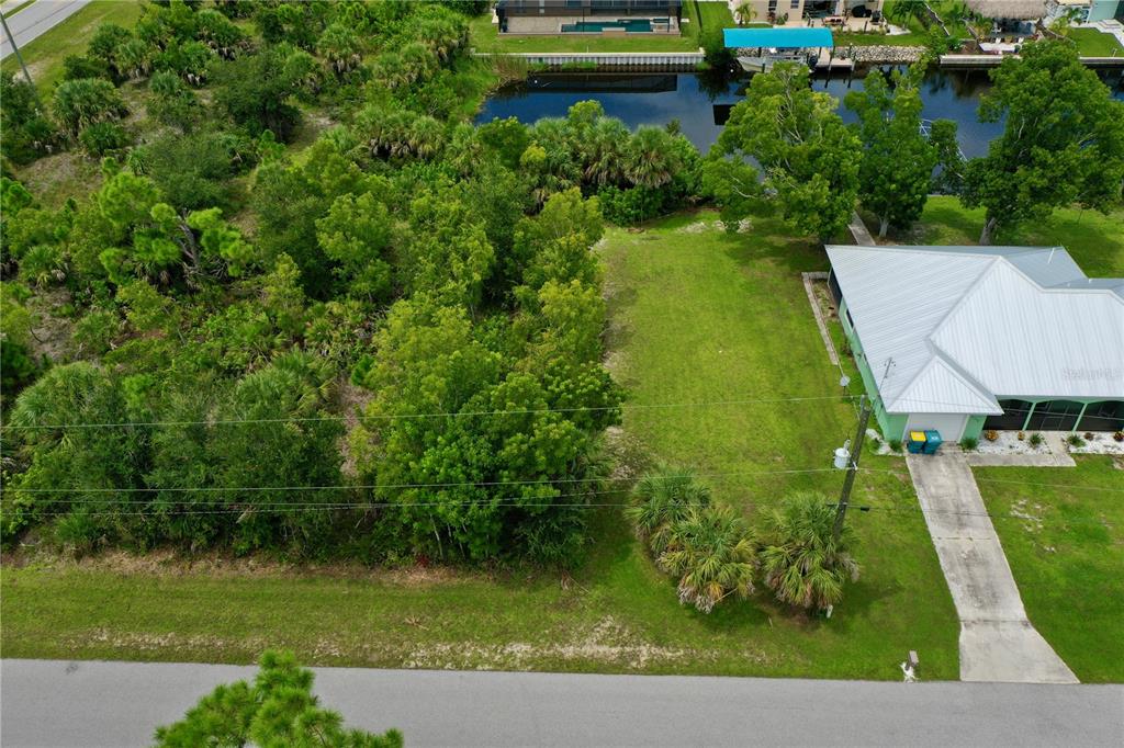 9150 Snapper Circle Port Charlotte, FL 33981 - Photo 1 of 27 a view of a lake with a park