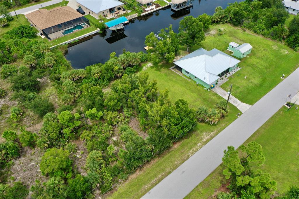 9150 Snapper Circle Port Charlotte, FL 33981 - Photo 11 of 27 an aerial view of a house with a yard