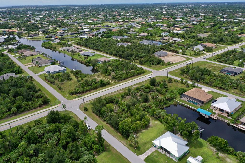 9150 Snapper Circle Port Charlotte, FL 33981 - Photo 12 of 27 an aerial view of residential houses with outdoor space and street view