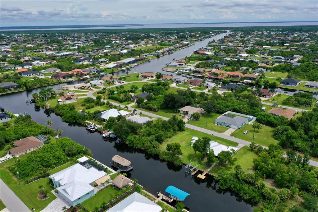 9150 Snapper Circle Port Charlotte, FL 33981 - Photo 14 of 27 an aerial view of a house with a garden