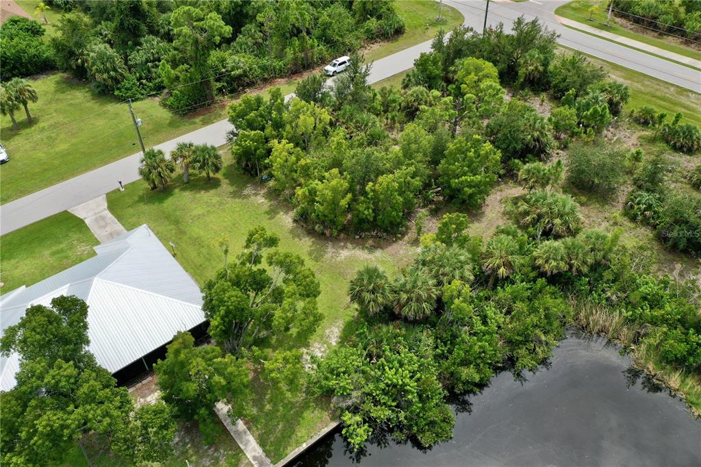 9150 Snapper Circle Port Charlotte, FL 33981 - Photo 16 of 27 an aerial view of a house with a yard