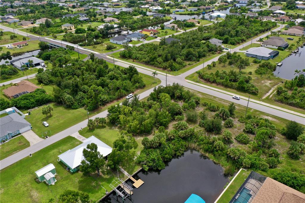 9150 Snapper Circle Port Charlotte, FL 33981 - Photo 4 of 27 an aerial view of a residential houses with outdoor space and street view