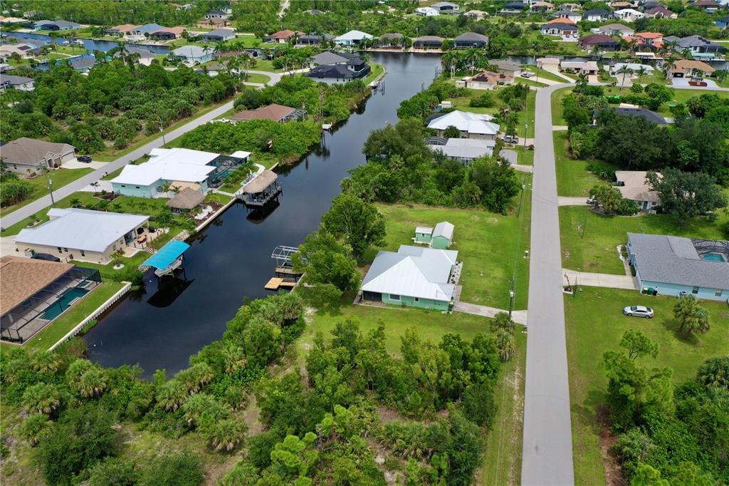 9150 Snapper Circle Port Charlotte, FL 33981 - Photo 7 of 27 an aerial view of residential houses with outdoor space and street view