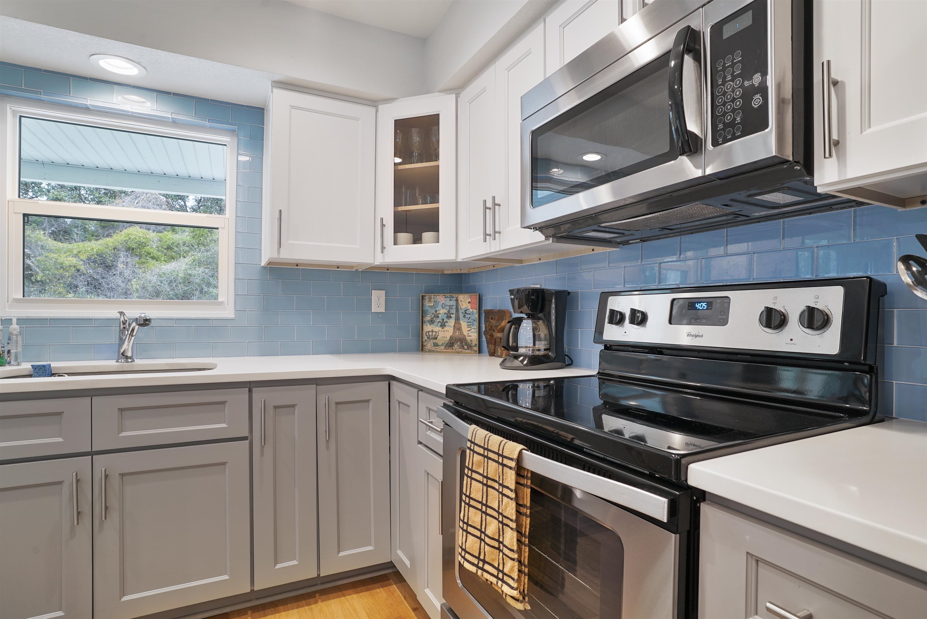 112 E Street St. Augustine, FL 32080 - Photo 13 of 41 a kitchen with stainless steel appliances granite countertop a stove and a sink