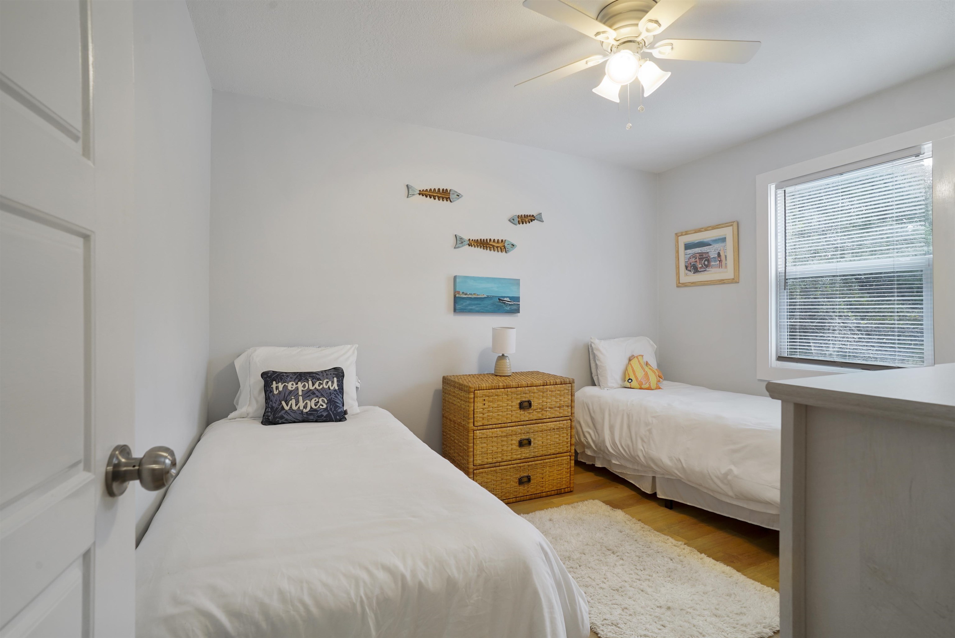 112 E Street St. Augustine, FL 32080 - Photo 15 of 41 a bedroom with a bed and a chandelier