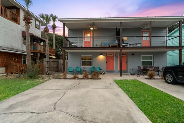 a kitchen with stainless steel appliances granite countertop a refrigerator sink and stove