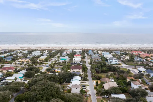 an aerial view of a city with lots of residential buildings