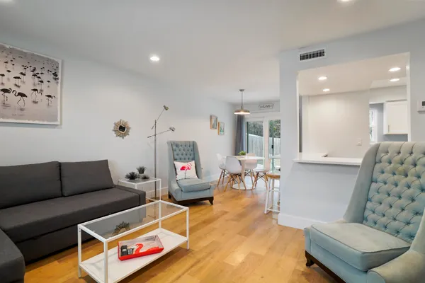 a kitchen with a sink stove and microwave